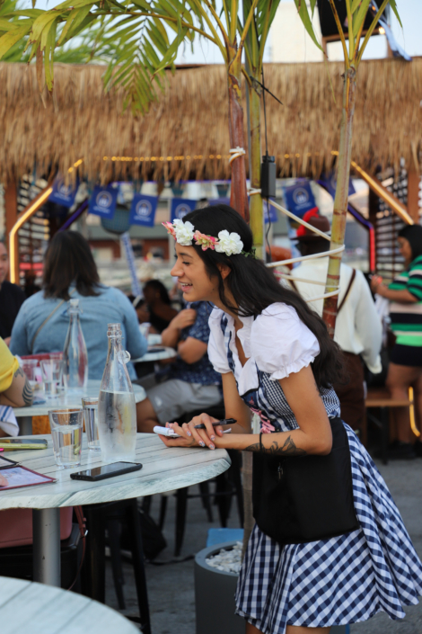 Waitress serving at OktoberFest NYC 2022 at Watermark