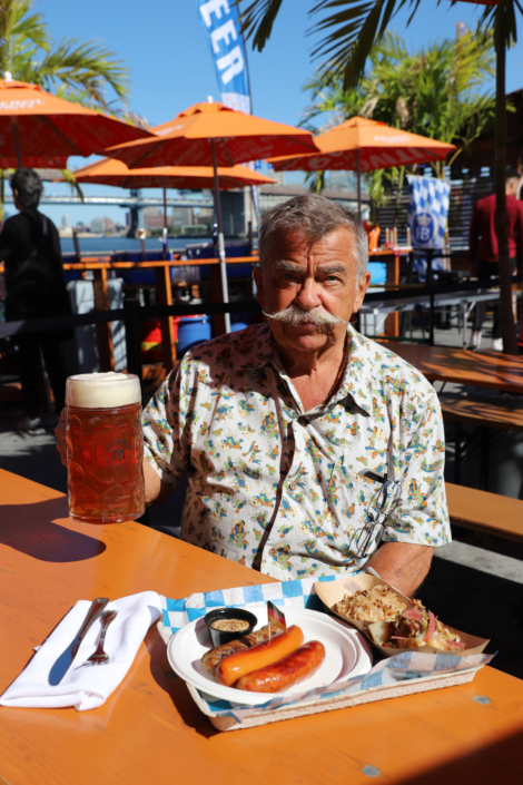 Man enjoying Beer in a Stein at OktoberFest NYC 2022 at Watermark