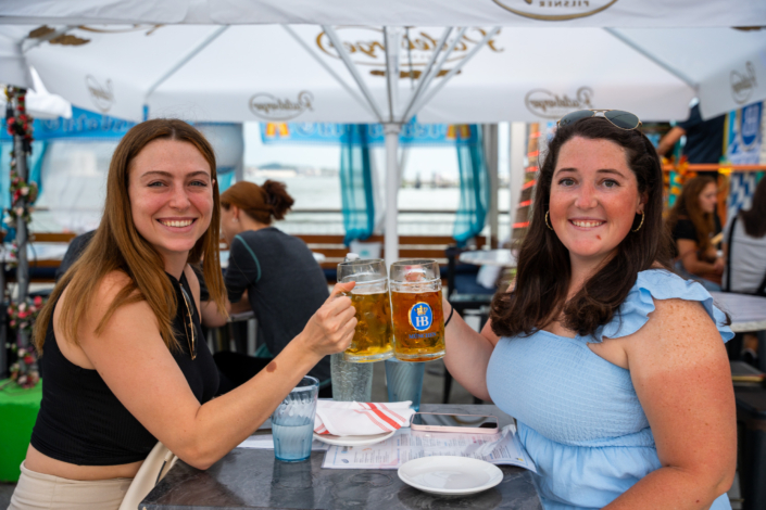 Girls Having Fun & Toasting in OktoberFest NYC 2023 at Watermark