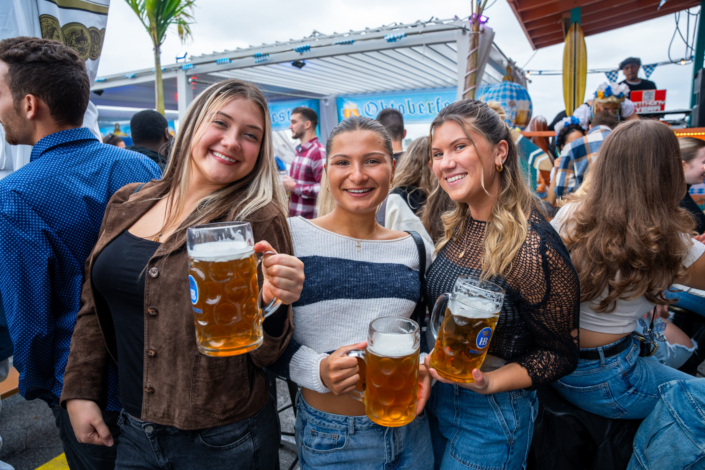 Girls Having Fun & Toasting in OktoberFest NYC 2023 at Watermark