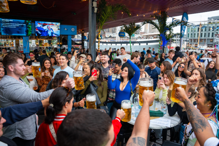 People having fun at OktoberFest NYC 2023 at Watermark - Beer Festival