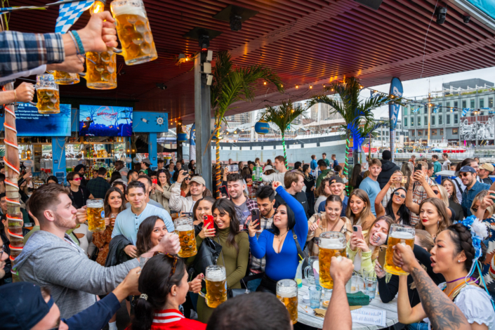 People having fun at OktoberFest NYC 2023 at Watermark - Beer Festival