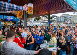 People having fun at OktoberFest NYC 2023 at Watermark - Beer Festival