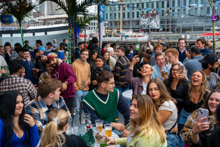 People having fun at OktoberFest NYC 2023 at Watermark - Beer Festival