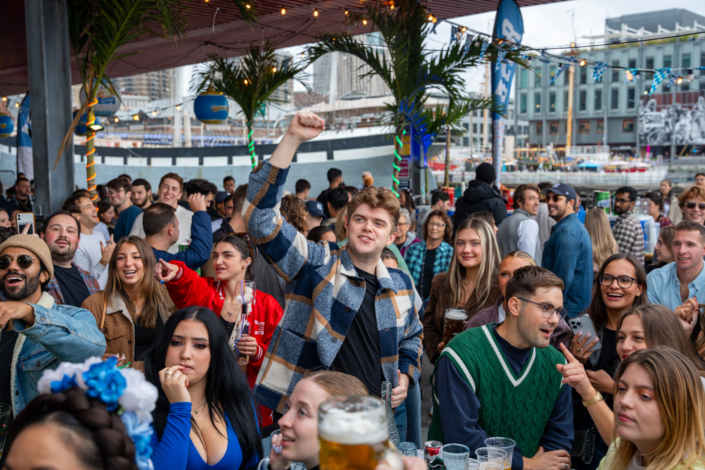 People having fun at OktoberFest NYC 2023 at Watermark - Beer Festival