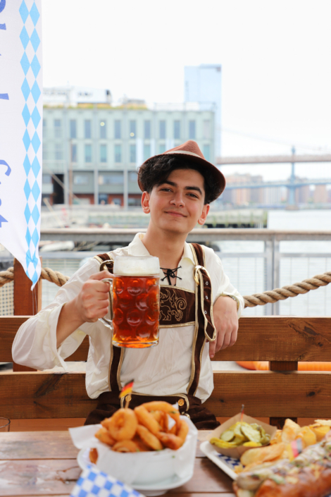 Man enjoying Beer in a Stein at OktoberFest NYC 2022 at Watermark