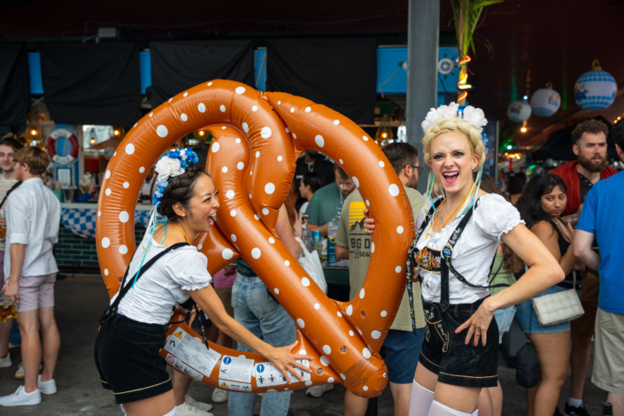 Models in German Lederhosen With Jumbo Pretzel at OktoberFest NYC 2023