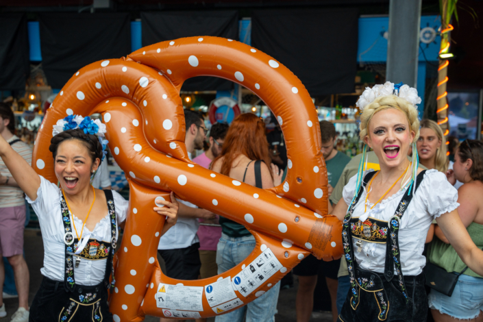 Models in German Lederhosen With Jumbo Pretzel at OktoberFest NYC 2023