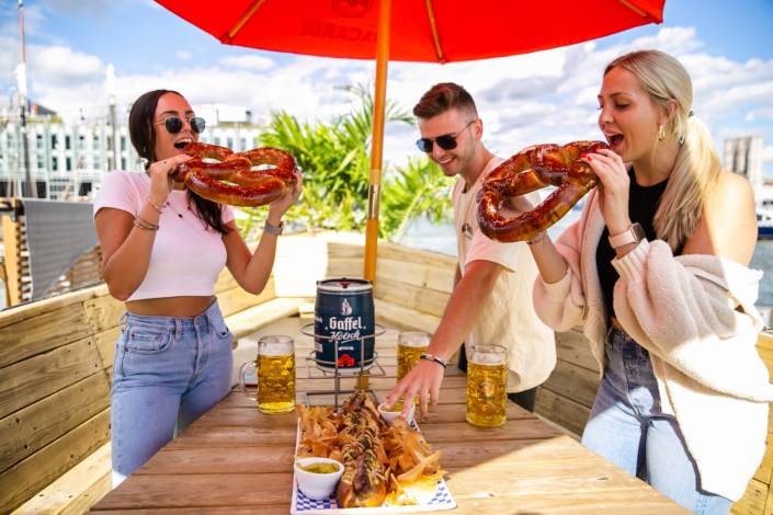 Friends enjoying food at OktoberFest NYC 2021